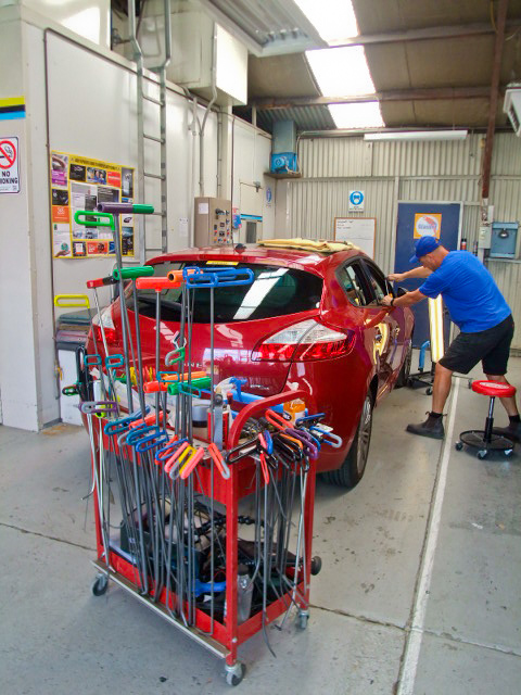 Performing PDR on a hail damaged car
